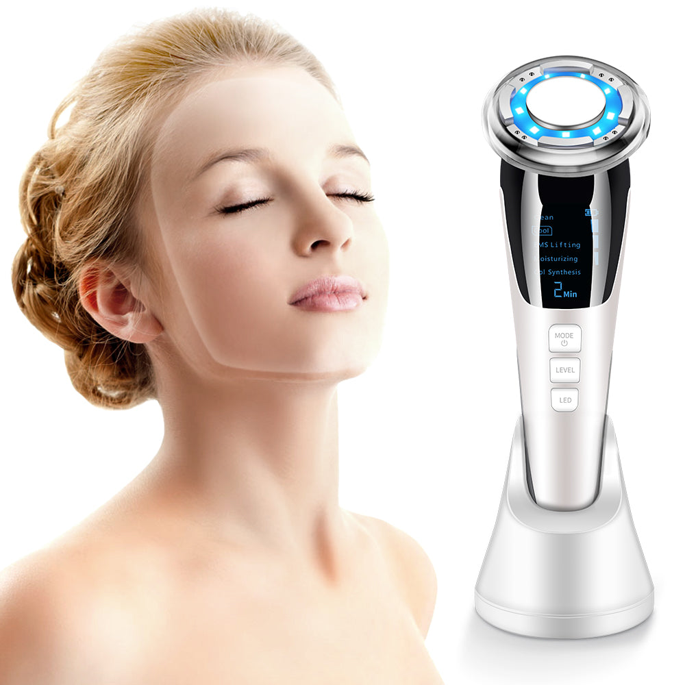 Woman using ultrasonic beauty device